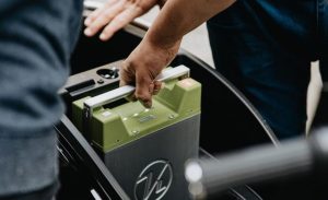 Man changing car battery