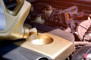 pouring engine oil